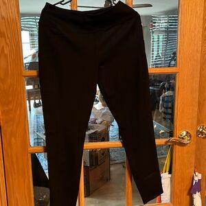 New with tags black yoga pants with pockets in both hips